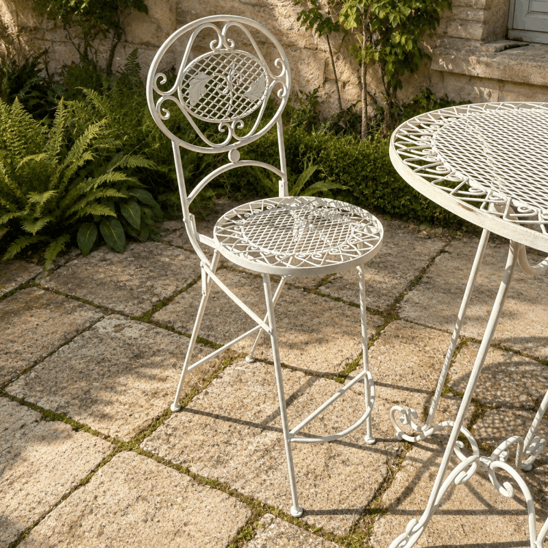 Silla alta plegable de jardín con respaldo floral calado