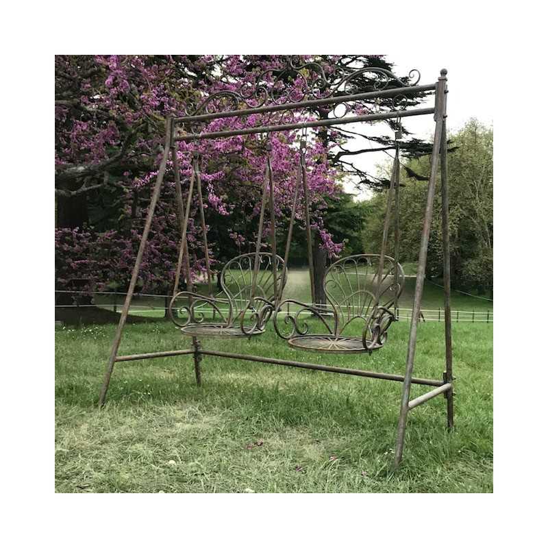 Rocking chair Fauteuil à bascule en fer et fonte patinée gris vieilli extérieur vue de profil