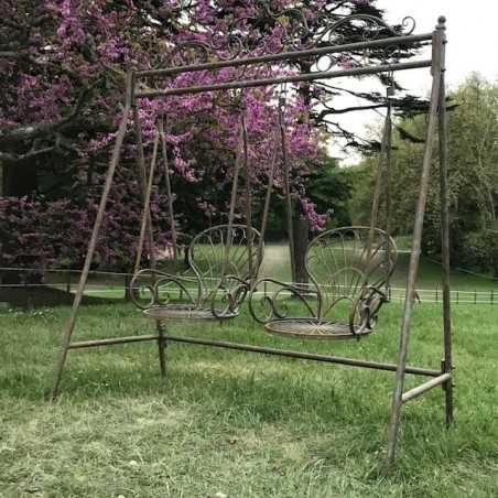 Rocking chair Fauteuil à bascule en fer et fonte patinée gris vieilli extérieur vue de profil