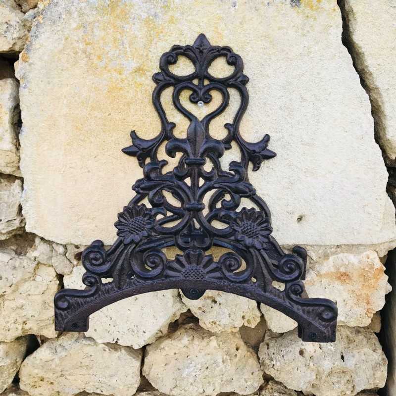 Portamanguera de pared de hierro fundido marrón
