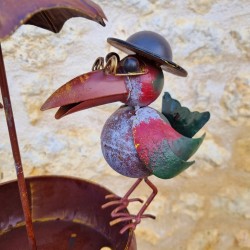 Comedero para pájaros de metal con parasol y dos aves