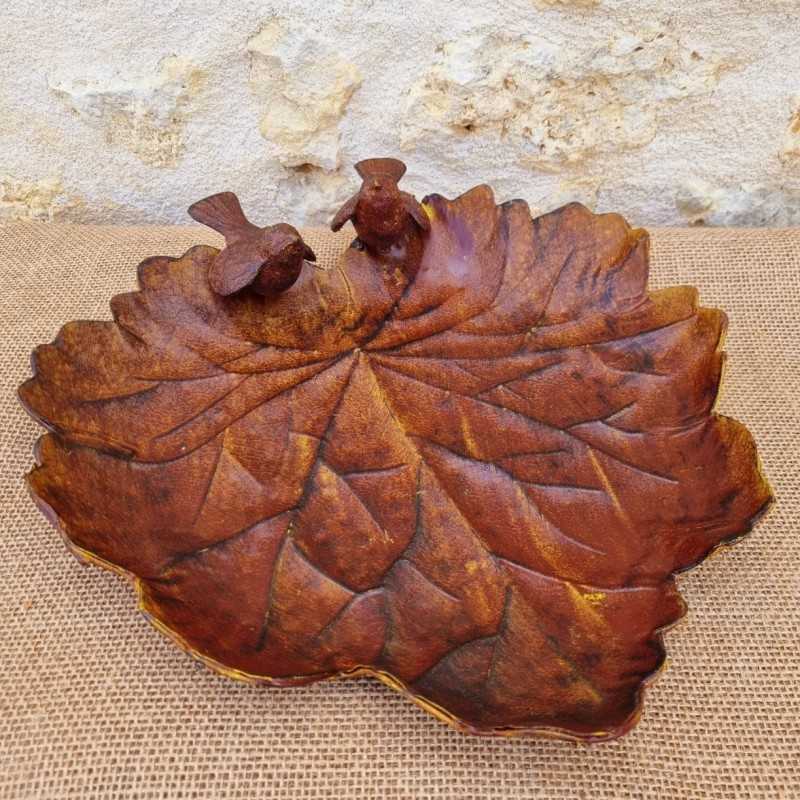 Mangeoire en forme de feuille couleur rouille patiné jaune