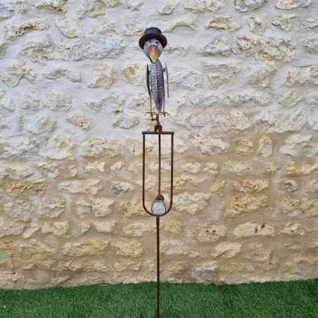 Balancín decorativo de cuervo con sombrero en metal y vidrio