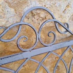 Banco de jardín de hierro forjado y madera