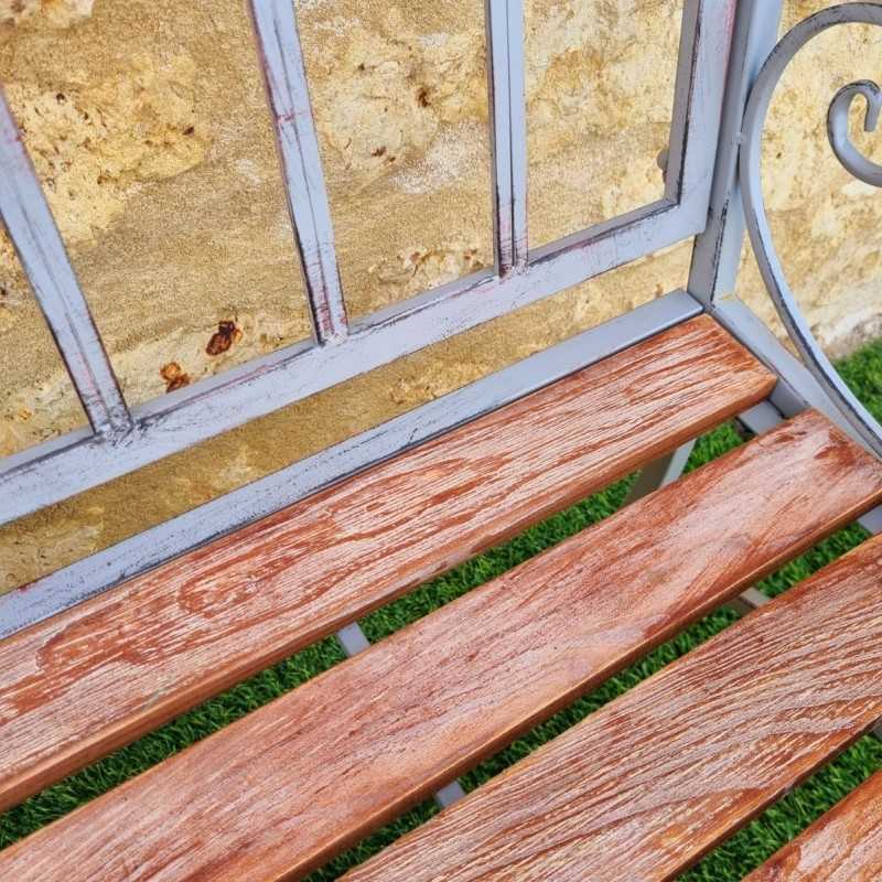 Banco de jardín de hierro forjado y madera