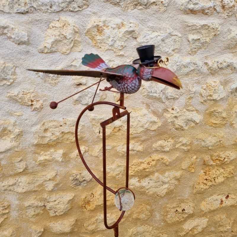 Balancier en fer oiseau coloré grandes ailes bouge avec le vent 44,90 € LEZARD DU JARDIN