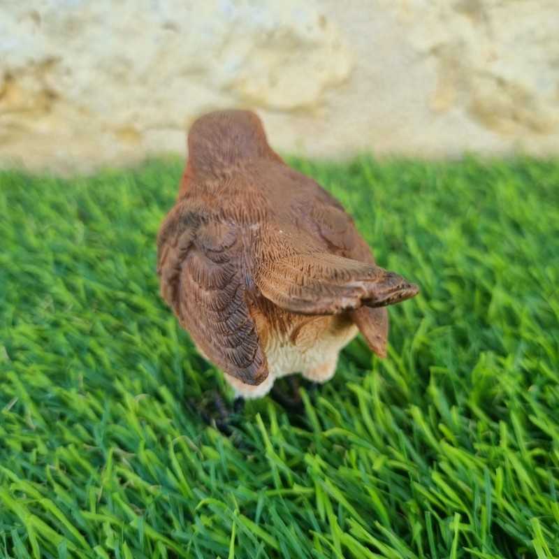 Oiseau en résine rouge
