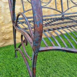 Banco de jardín de hierro forjado estilo rústico
