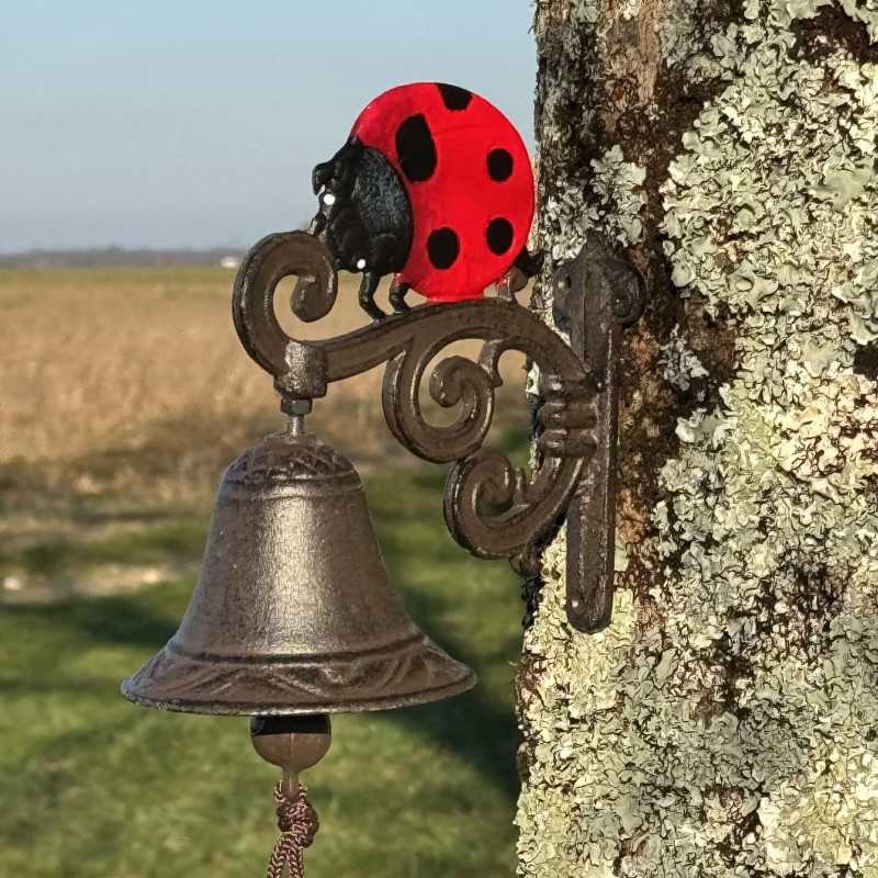 campana de pared exterior en hierro fundido