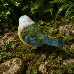 Figura de pájaro amarillo, azul y verde – Vista lateral